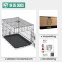 Metalen hondenbench met verpakking en handleiding.