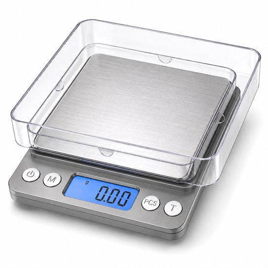 Balance de précision numérique avec plateau en inox argenté, écran bleu et couvercle de protection transparent.