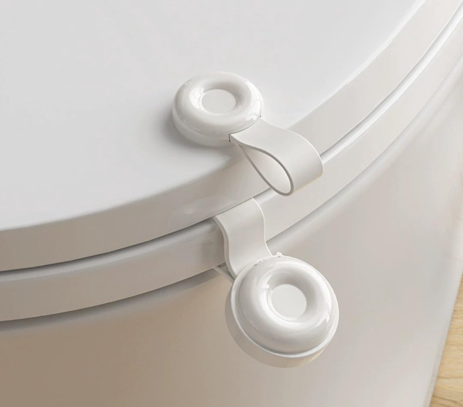 Handgreep voor het optillen van de toiletbril of -deksel