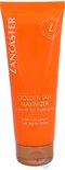 Lancaster Golden Tan Maximizer after sun lotion in oranje tube met witte tekst. Cirkelvormig logo met 'ONE MONTH TAN PROLONGING'.