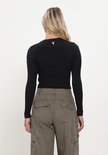 Zwarte, nauwsluitende ribgebreide longsleeve met een witte stier op de achterkant.