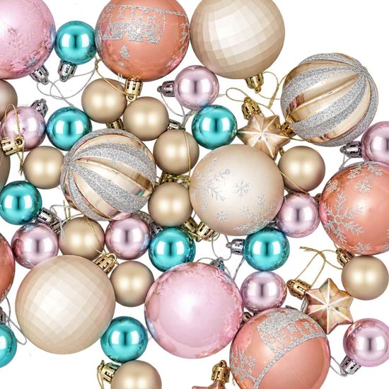 Assortiment de boules de Noël en rose, or, turquoise et motifs pailletés, avec des ornements en forme d'étoile.