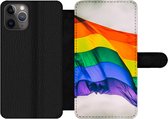 Bookcase Geschikt voor iPhone 11 Pro Max telefoonhoesje - Foto van een regenboog vlag - Met vakjes - Wallet case met magneetsluiting