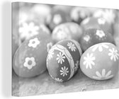 Tableau sur toile Oeufs de Pâques sur une table pour Pasen - noir et blanc - 90x60 cm - Décoration murale