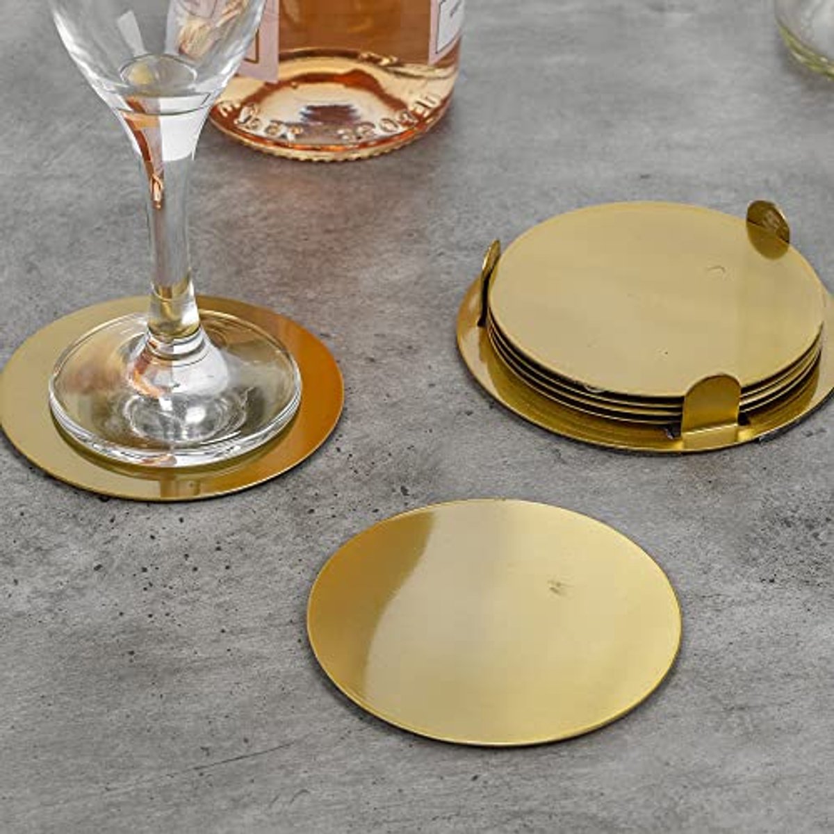 Ronde, zilverkleurige metalen onderzetters - Set van 7, 9 cm