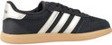 Zwarte Adidas sneaker met gouden strepen en een gummi zool.