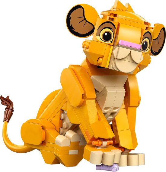 Gele LEGO Simba welp, zittend, met beige buik en groene plant.