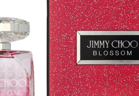 Doos en fles Jimmy Choo Blossom, roze met witte spikkels en facetdop.