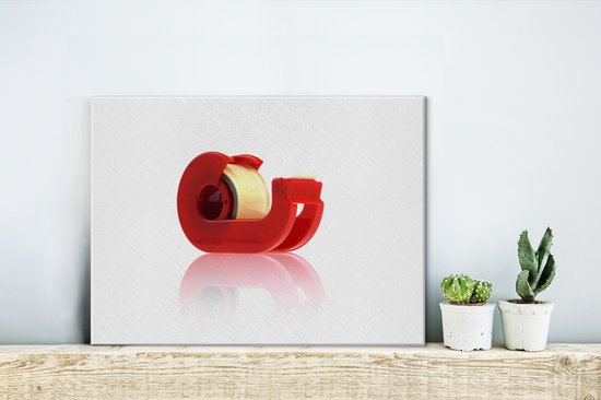 Support rouge avec un rouleau de ruban adhésif 40x30 cm - petit - Tirage photo sur toile (Décoration murale salon / chambre)