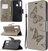 Voor Galaxy A21 Twee vlinders reliëfpatroon horizontaal Flip lederen tas met houder & kaartsleuf & portemonnee & lanyard (grijs)