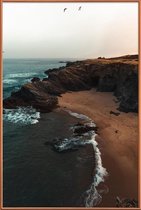 JUNIQE - Poster met kunststof lijst Portuguese Beach Coast with Birds