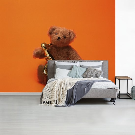 Papier fotobehang Ours en peluche avec un saxophone