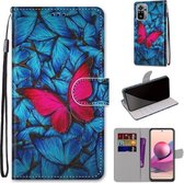 Voor Xiaomi Redmi Note 10 4G / Note 10S Gekleurde tekening Cross Texture Horizontale flip PU lederen tas met houder & kaartsleuven & portemonnee & lanyard (blauw rood vlinder)