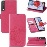 Voor LG Stylo 7 4G Vier-blad Sluiting Reliëf Gesp Mobiele Telefoon Bescherming Lederen Case met Lanyard & Card Slot & Portemonnee & Beugel Functie (Magenta)