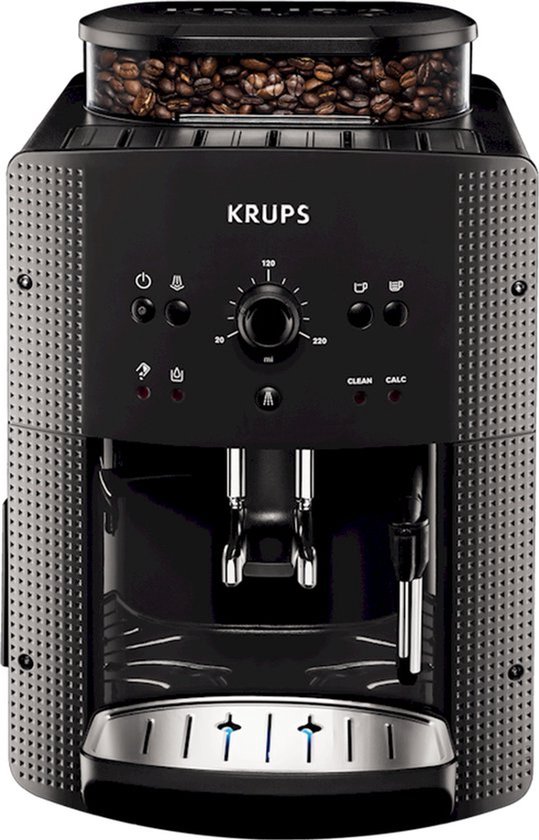 Zwarte Krups volautomatische espressomachine met koffiebonen in de bovenste tank en een glanzende zilveren lekbak.