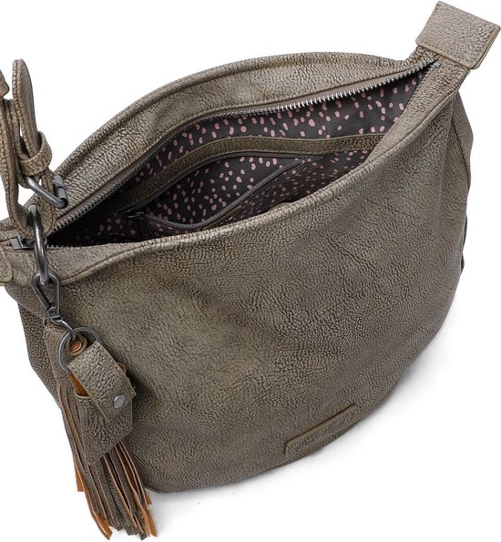 Sac hobo vert avec un compartiment ouvert et un gland. La doublure intérieure présente un motif à pois roses et noirs.