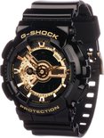 Zwarte G-Shock horloge met gouden details en analoge/digitale wijzerplaat. Zwarte band.