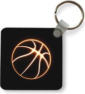 Sleutelhanger - Uitdeelcadeautjes - Een illustratie van een lichtgevende basketbal - Plastic