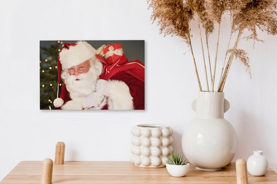 Un portrait du Père Noël portant un sac rouge sur son épaule toile 30x20 cm - petit - Tirage photo sur toile (Décoration murale salon / chambre)
