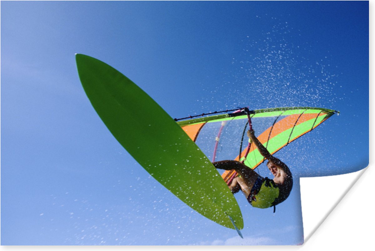 Un véliplanchiste accroche dans les airs Poster 180x120 cm - Tirage photo  sur Poster