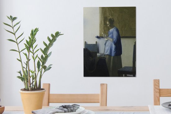 Canvas schilderij 30x40 cm - Wanddecoratie Brieflezende vrouw in het