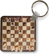 Sleutelhanger - Uitdeelcadeautjes - Een schaakbord vol met stukken - Plastic