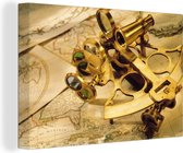 Canvas Wereldkaart - 60x40 - Wanddecoratie Een sextant om mee te navigeren bovenop wereldkaarten