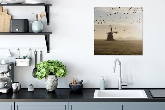 Tableau sur toile Oies au-dessus d'un moulin à vent aux Nederland - 50x50 cm - Décoration murale