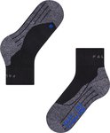 Chaussettes de randonnée noires avec accents gris et amorti sur la semelle. Logo 'R' sur la chaussette gauche.