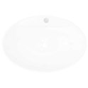 Lavabo ovale en céramique blanc avec trop-plein et trou pour robinet.