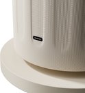 Close-up van de getextureerde zijkant van een beige diffuser met een USB-C poort.