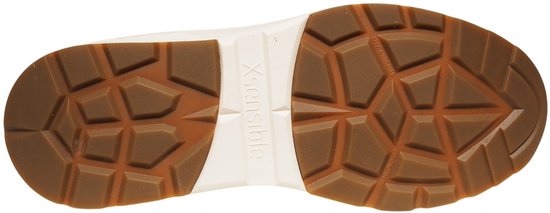 Onderkant van een donkerbruine suède veterschoen met witte zool en bruin rubberen loopvlak met geometrisch patroon.