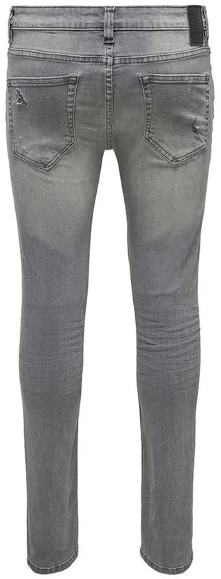 Achterkant van grijze skinny jeans met lichte verkleuringen en subtiele scheuren.