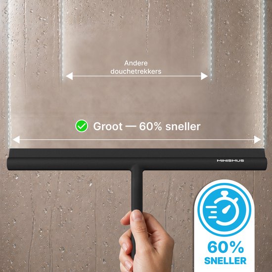 Une main utilise un racloir de douche noir, plus grand que d'autres, sur une paroi de douche humide. Texte : 'Large - 60% plus rapide'.