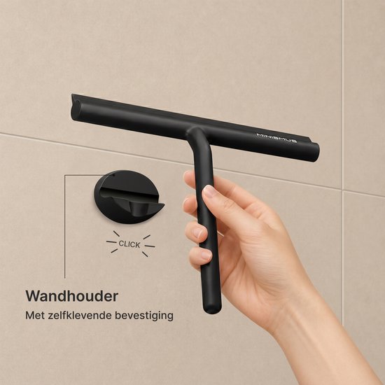 Raclette de douche noire avec une poignée courbée, tenue par une main. À côté d'un support mural rond noir avec "CLICK".