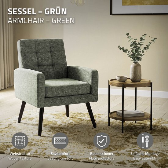 Groene fauteuil met armleuningen en gestoffeerde zitting in een woonkamer. Iconen tonen geweven textuur, zitcomfort, vloerbeschermers en montage.