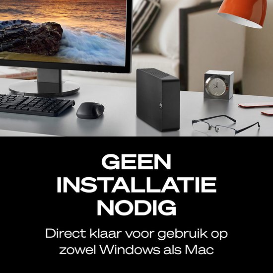 Disque dur externe noir sur un bureau, prêt à l'emploi sur Windows et Mac.