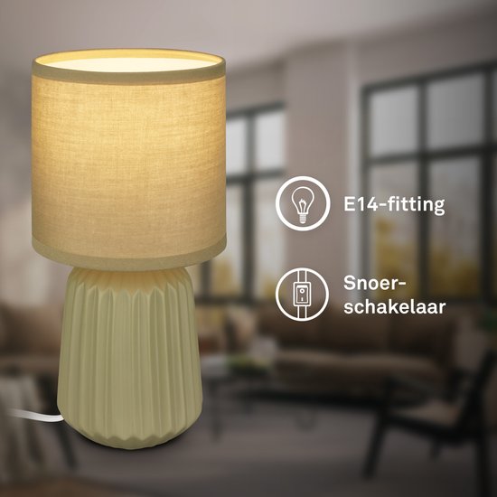 Lampe de table verte avec abat-jour textile et pied en céramique, avec douille E14 et interrupteur sur fil.