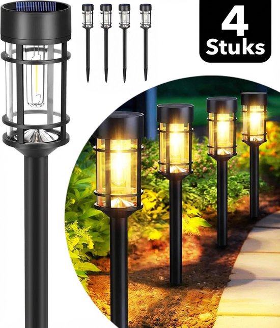 Vier zwarte solar tuinlampen met vlam-effect LED, opstelling.