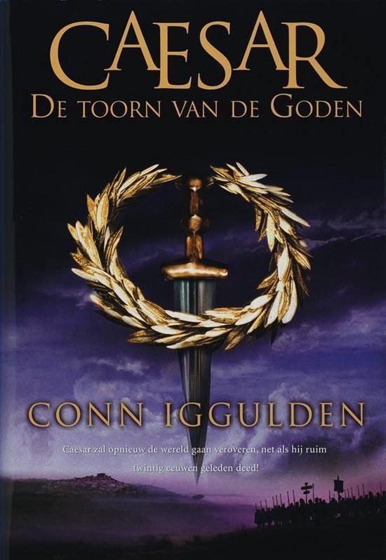 Boekomslag met de titel 'CAESAR De Toorn Van De Goden' door Conn Iggulden. Een zwaard met lauwerkrans, tegen een dramatische lucht.