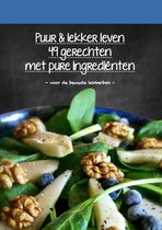Kookboek 'Puur & lekker leven' met 49 gerechten van pure ingrediënten. Een salade van spinazie, peer, walnoten en bosbessen.