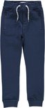 Donkerblauwe joggingbroek met trekkoord en ritszakken.