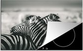 KitchenYeah® Inductie beschermer 76x51.5 cm - Knuffelende zebra's - Kookplaataccessoires - Afdekplaat voor kookplaat - Inductiebeschermer - Inductiemat - Inductieplaat mat