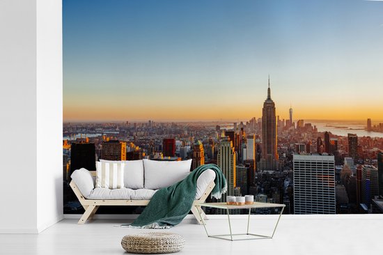 Papier peint Papier peint photo en vinyle - Skyline de New York avec un coucher de soleil largeur 390 cm x hauteur 260 cm - Tirage photo sur papier peint (disponible en 7 tailles)