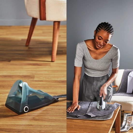 Vrouw met gevlochten haar stoomt een grijs kledingstuk met het Tefal Duo Power strijkijzer.