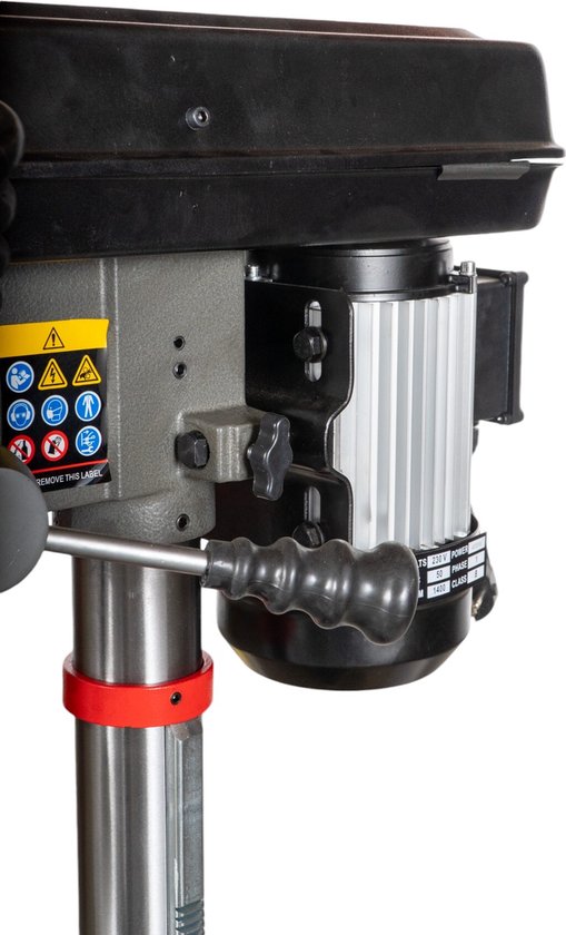 Grijze boormachine met aluminium motor, zwarte kap en 3 metalen hendels.