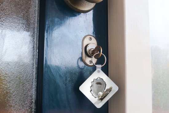 Porte-clés - Perle dans une huître - Plastique