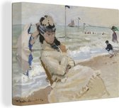 Canvas Schilderij Camille on the beach at Trouville - schilderij van Claude Monet - 40x30 cm - Wanddecoratie