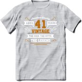 41 Jaar Legend T-Shirt | Goud - Wit | Grappig Verjaardag en Feest Cadeau Shirt | Dames - Heren - Unisex | Tshirt Kleding Kado | - Licht Grijs - Gemaleerd - S