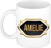 Amelie naam cadeau mok / beker met gouden embleem - kado verjaardag/ moeder/ pensioen/ geslaagd/ bedankt
